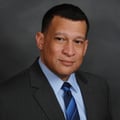Dr. Michael James