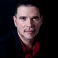 Dr. Manny John González